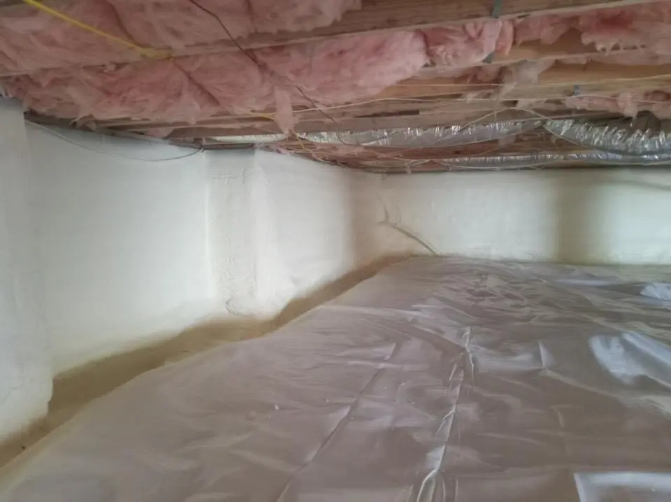 Crawl space encapsulation with closed-cell spray foam for Commercial Roof Restoration in Donaldsonville